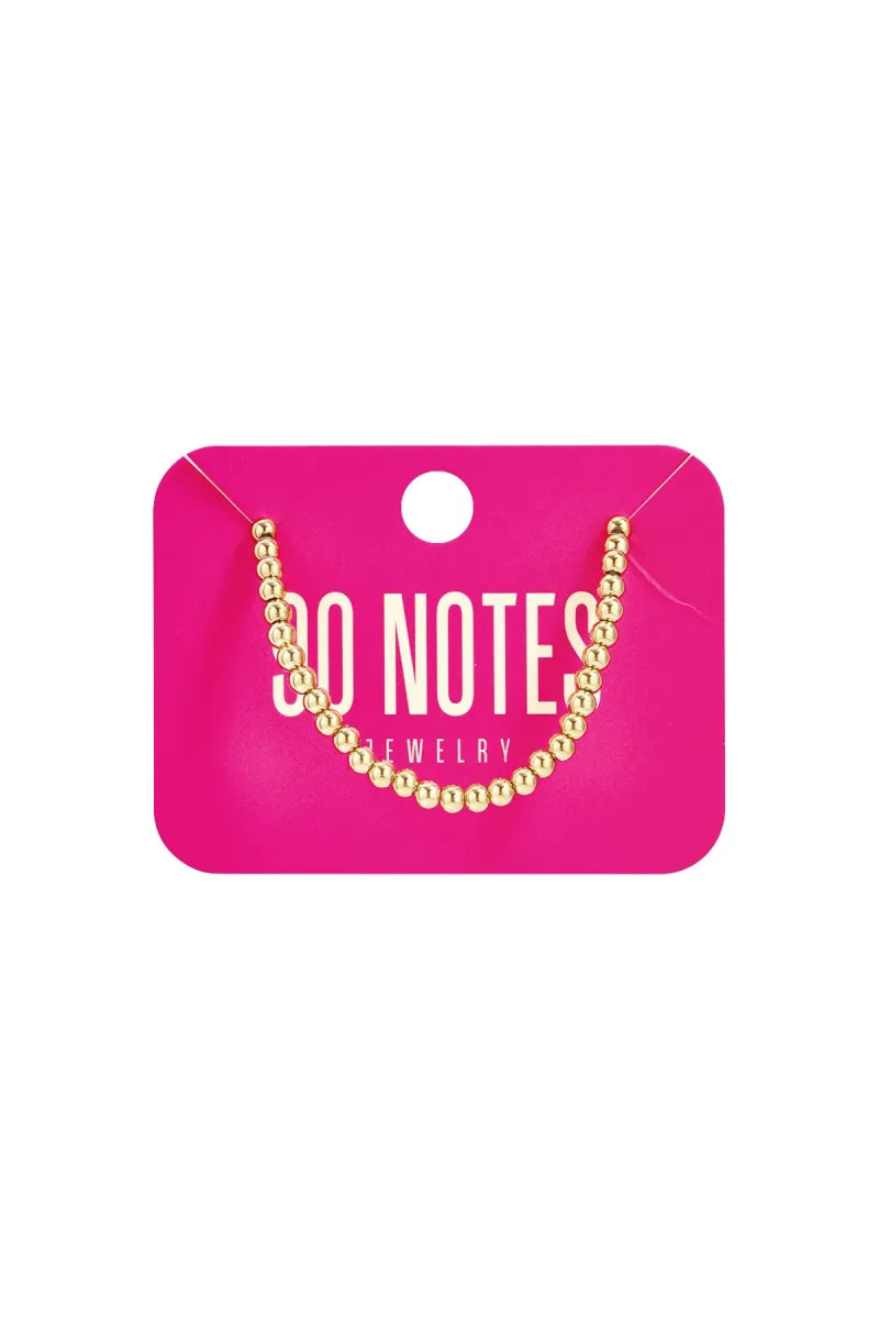  90 NOTES - 4mm kralen armband - goud