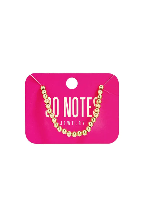  90 NOTES - 5mm kralen armband - goud