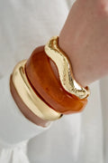  Golvende gestructuurde bangle - goud