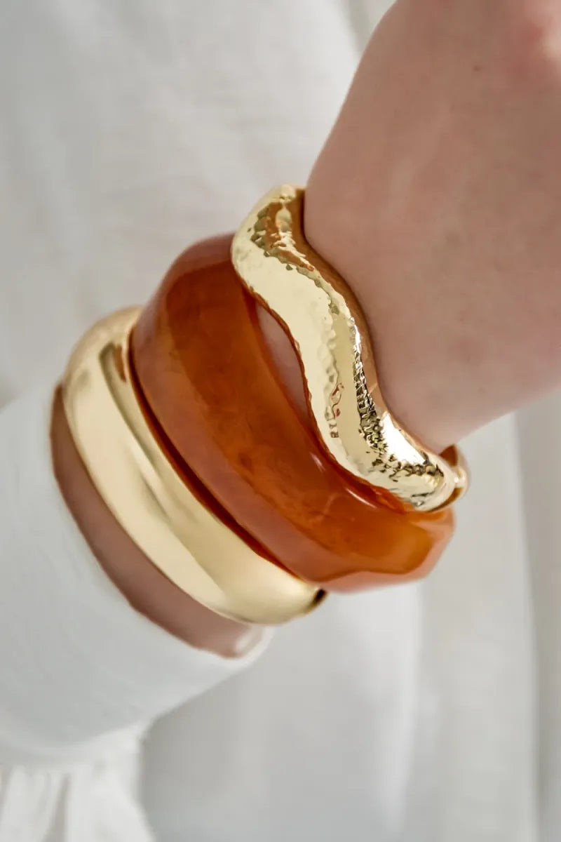  Golvende gestructuurde bangle - goud