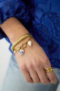 Chunky gestreepte bangle - goud
