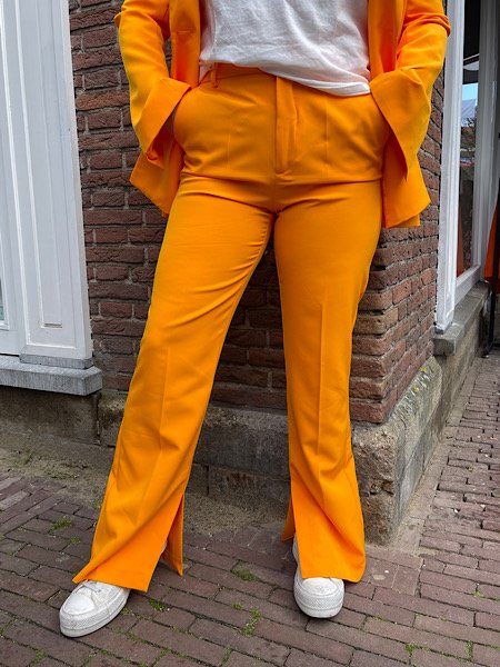 Oranje pantalon met split