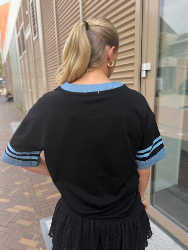 Zwarte jersey denim details