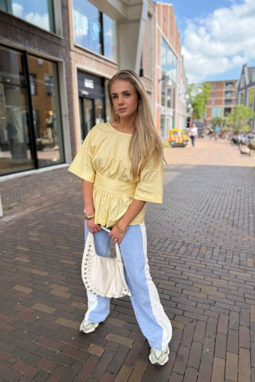 Gele blouse met strik op de rug