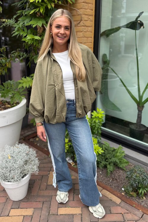 Donkerblauwe jeans met strepen en strik