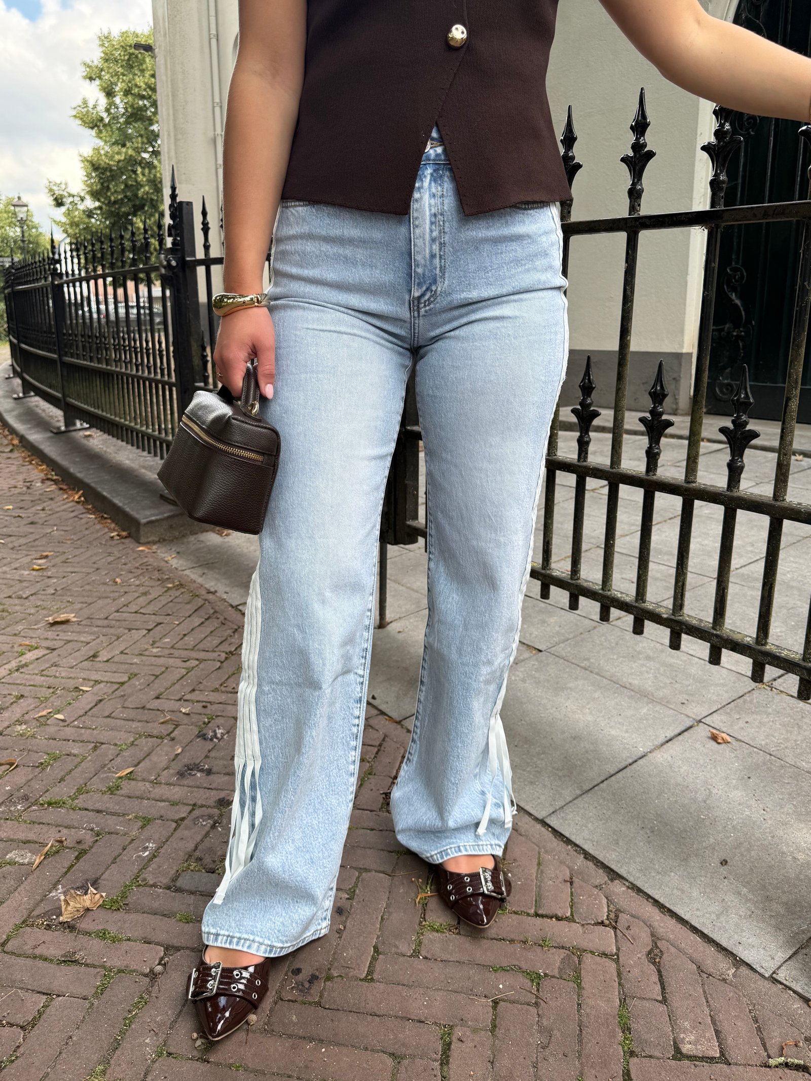 Blauwe stretch jeans met strepen en strik