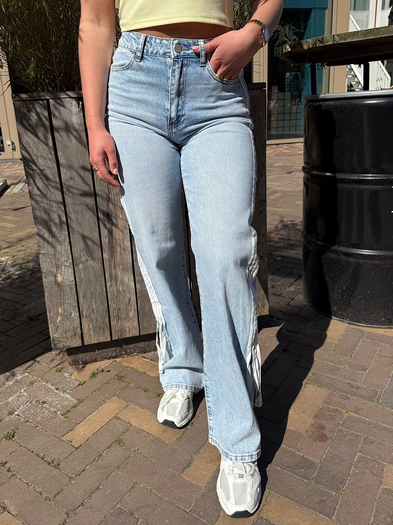 Blauwe stretch jeans met strepen en strik