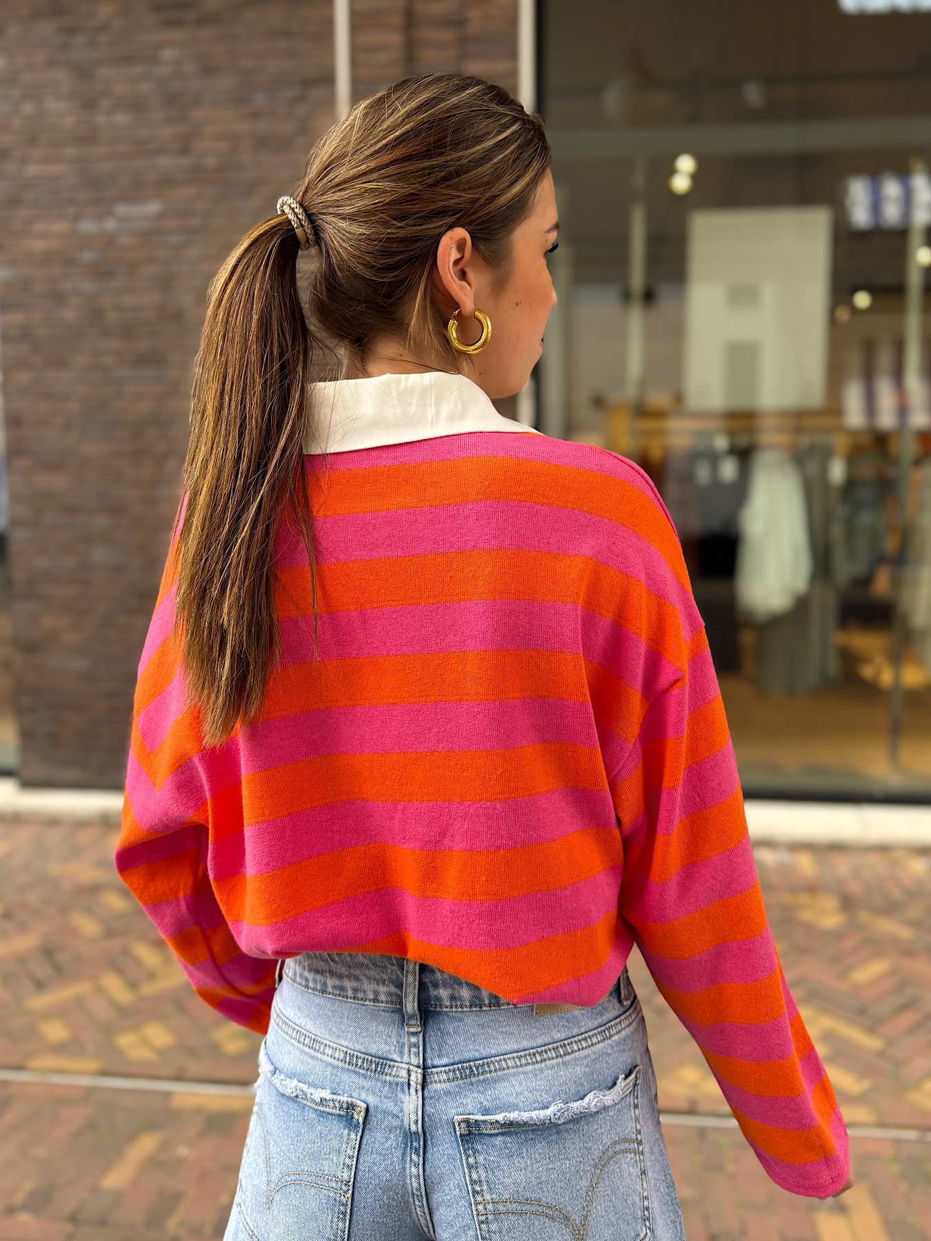 Oranje/ roze gestreepte polo Jessy
