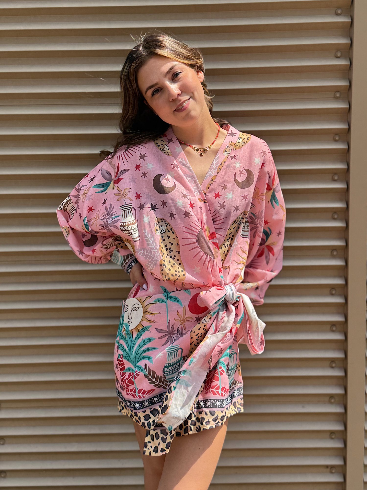 Roze astro print overslag jurk