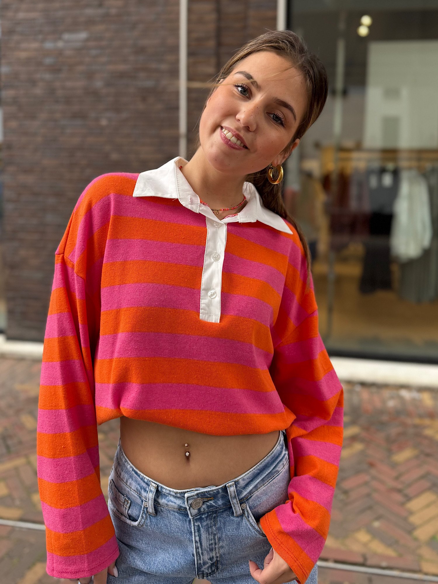 Oranje/ roze gestreepte polo Jessy