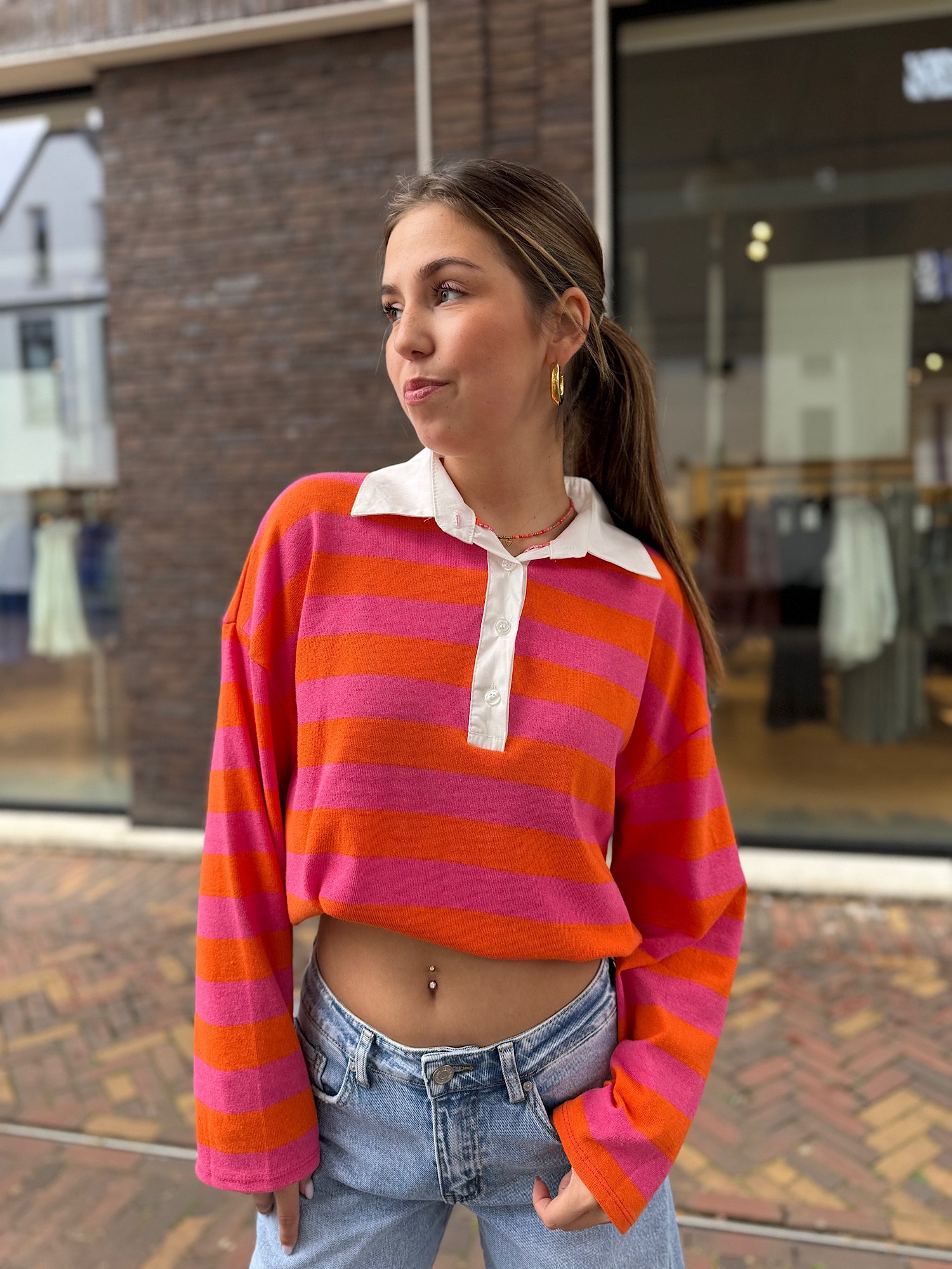 Oranje/ roze gestreepte polo Jessy